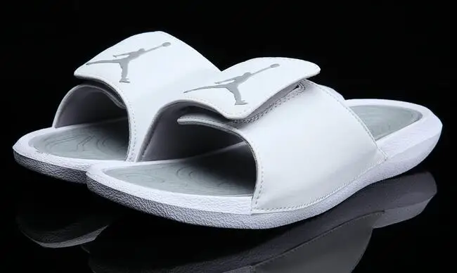 all white jordan slippers