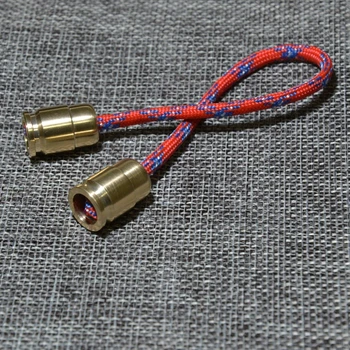 

Brass Bullet Parachute Cord Lanyard Bead Pendant Finger Toy