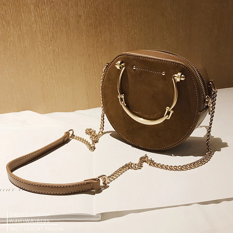 

2019 Fashion New Handbag High quality Women's bag Round Tote bag Hand Metal Ring Chain Shoulder Travel bag