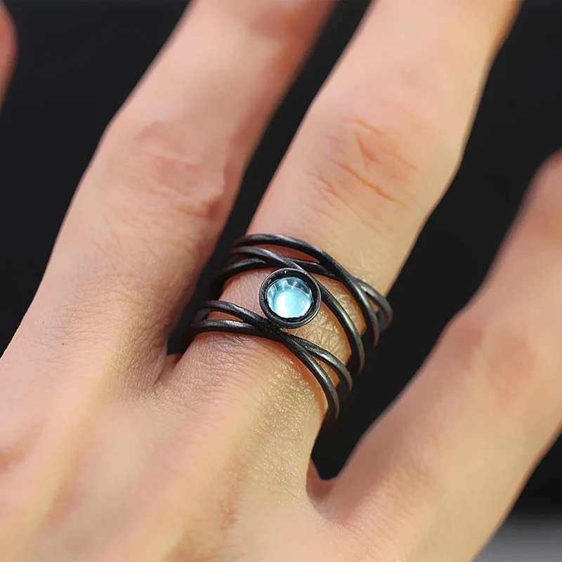 

Cross-Border Creative Abstract Art Lines Winding Moonstone Ring Europe And the United States Exaggerated Black Gold Ring
