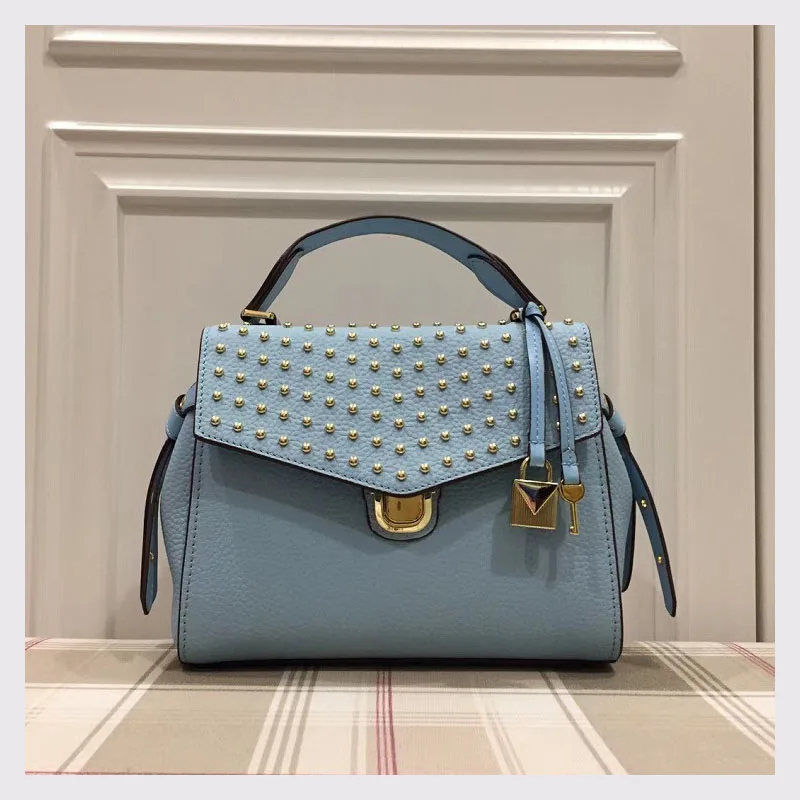 

European and American style fashion brand women leather handbags geometric pattern rivet decoration genuine leather bag
