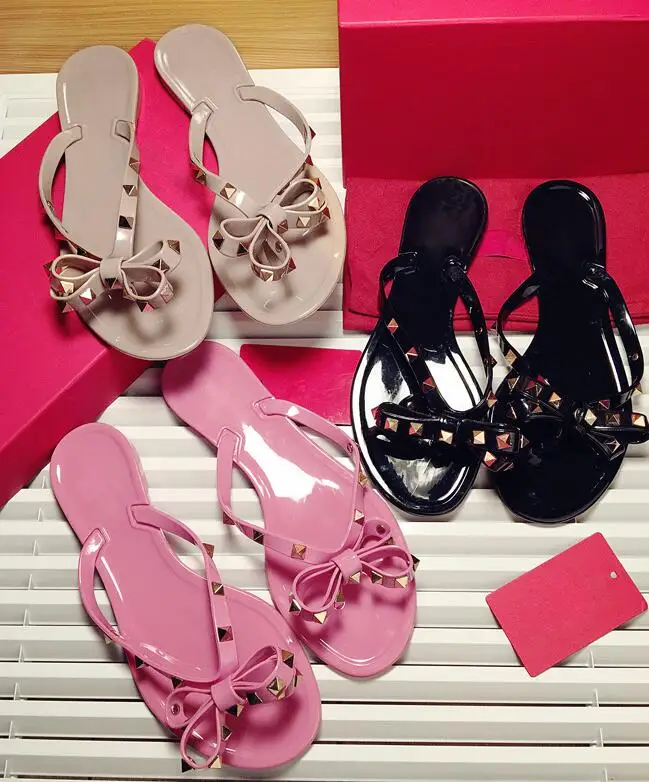 

2018 summer new women's shoes rivets bow flat non-slip sandals and slippers jelly rubber shoes beach shoes (no box)