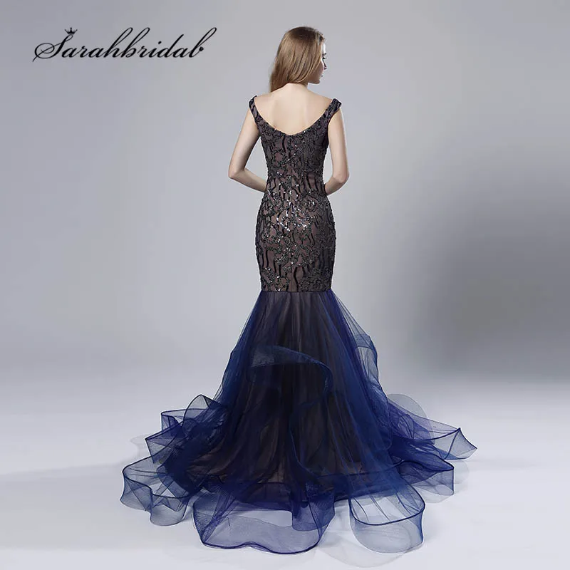 Navy Blue Evening Dresses Long Mermaid Sexy V Neck Cap Sleeves Backless Vestido de Noche Ruffles Skirt Beaded Prom Gowns CC528 Navy Blue Evening Dresses Long Mermaid Sexy V Neck Cap Sleeves Backless Vestido de Noche Ruffles Skirt Beaded Prom Gowns CC528