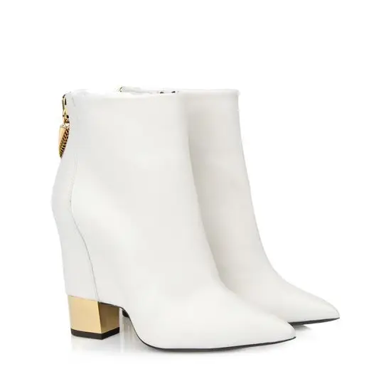 white and gold booties