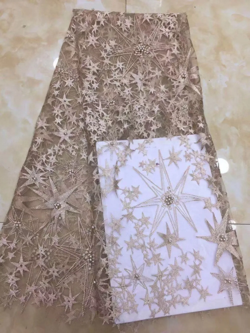 

The new French embroidered fabric, high quality Christmas dress fabric with fine beads