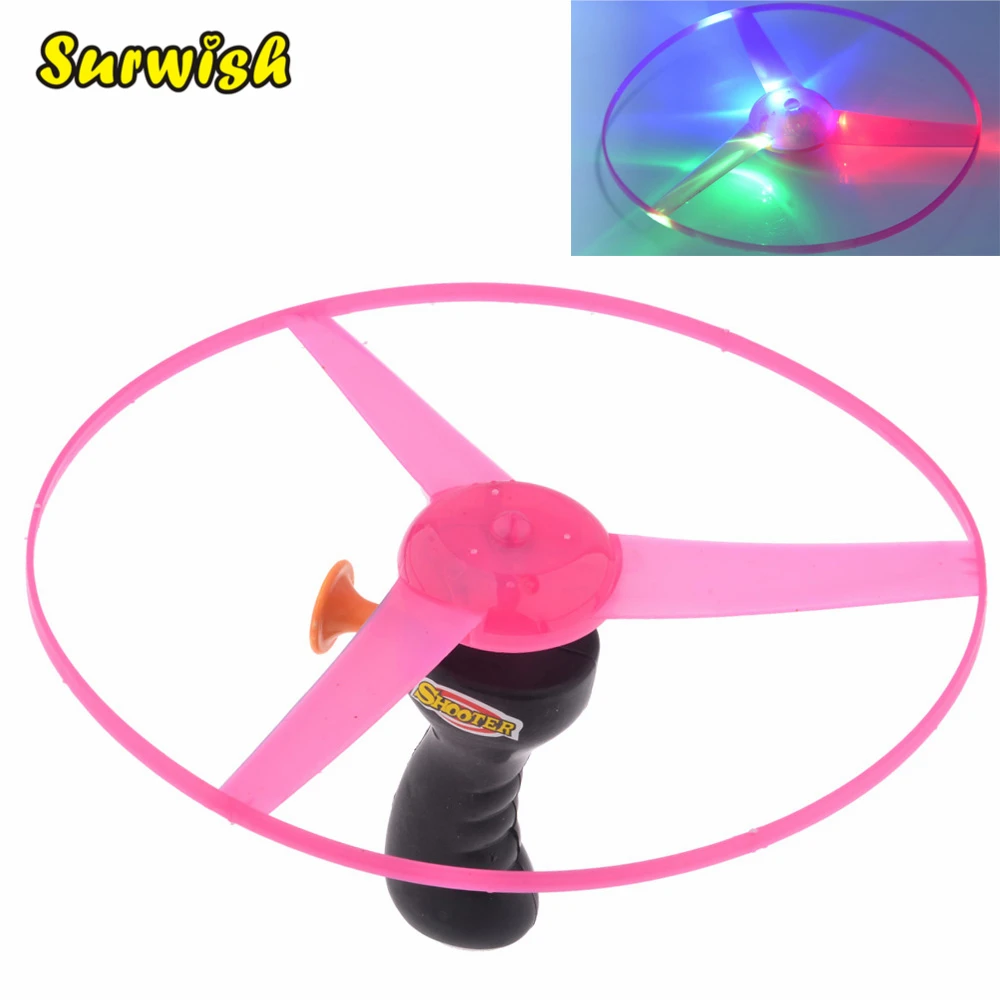 Surwish الملونة مضحك سحب سلسلة الملونة مصباح ليد Up تحلق الصحن القرص الاطفال لعبة كما الأطفال العام الجديد هدية