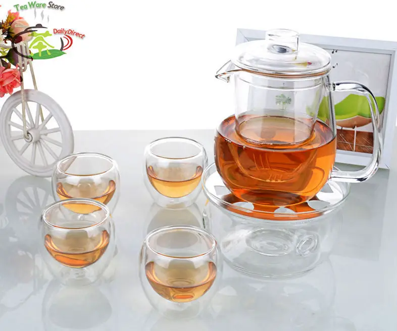1x Clear Tea Set -610ml Heat Resistant Glass Teapot 4x 90ml Double Wall Cups 1 x Round Shape Teapot Warmer 1x Clear Tea Set -610ml Heat Resistant Glass Teapot 4x 90ml Double Wall Cups 1 x Round Shape Teapot Warmer