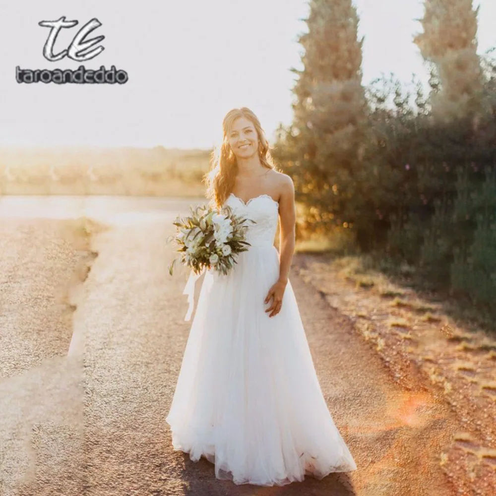 

Sweetheart Neckline White Wedding Dresses 2019 A Line Sleeveless Lace Applique Open Back Tulle Bridal Gown Dress with Satin Sash