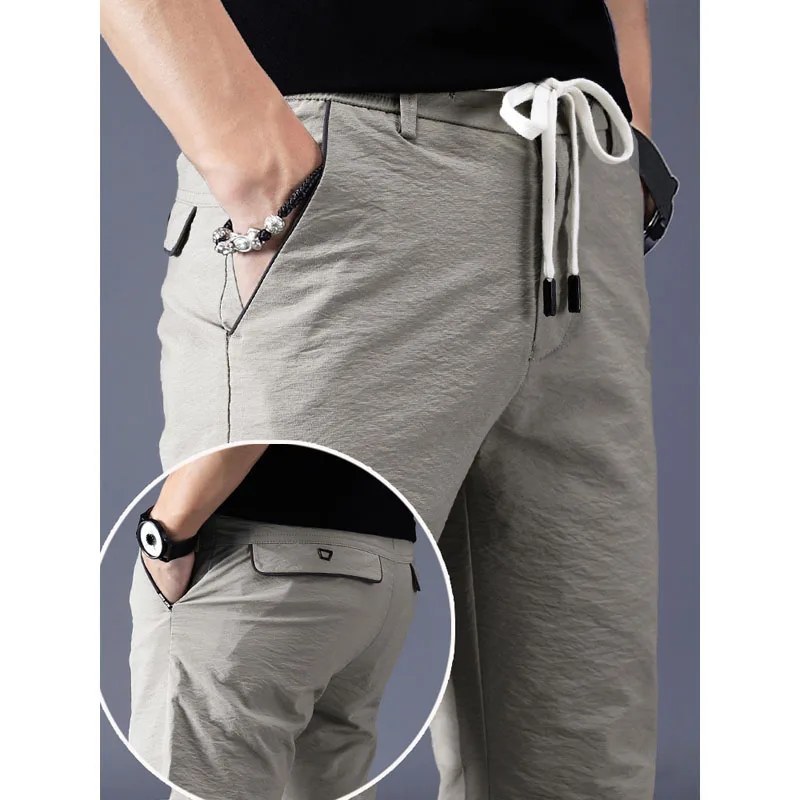 Leisure Pants Ice Silk Summer Autumn Trousers Men's Ultra-thin Solid Smart Casual Sports Air-conditioned Long Mens Pants Brand Leisure Pants Ice Silk Summer Autumn Trousers Men's Ultra-thin Solid Smart Casual Sports Air-conditioned Long Mens Pants Brand