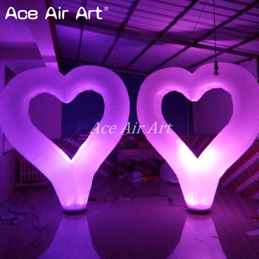

giant standing freely valentine's day decoration inflatable heart with led lighting and base fan for event