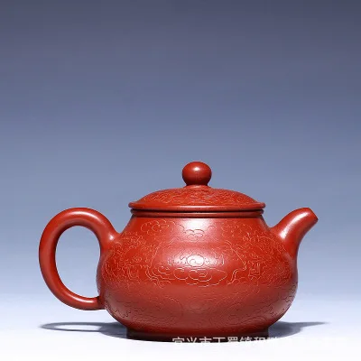 

2018 new style 200ml Yixing famous handmade Zhu mud Dahongpao purple sand pot supreme pan pot hand carved dragon pattern tea set