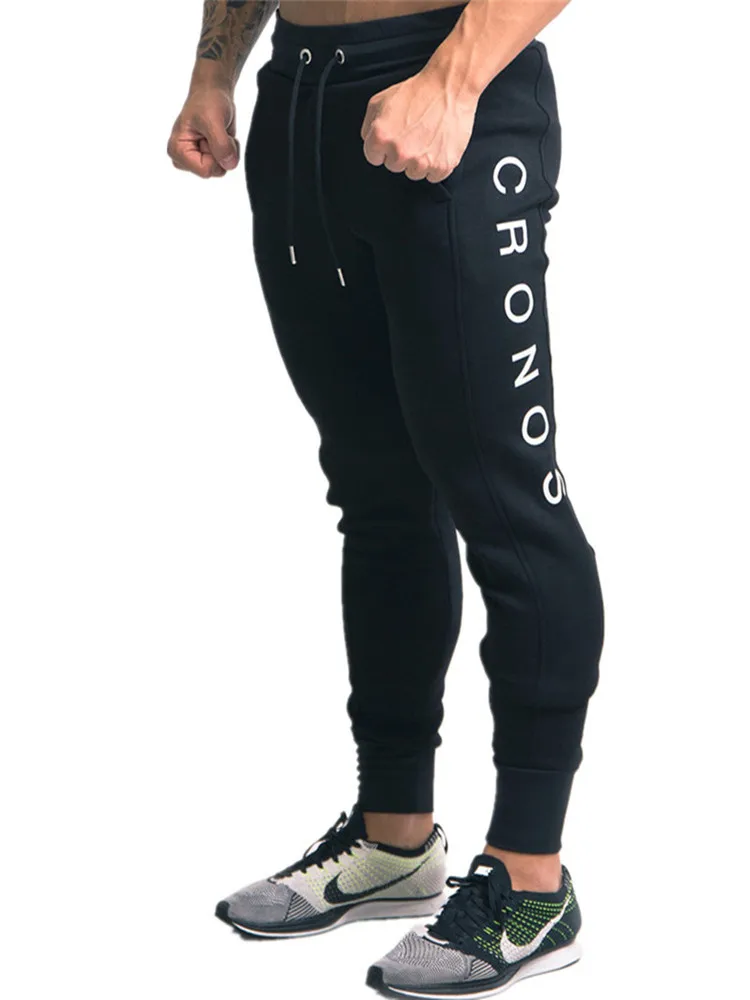 Baratos YEMEKE 2019 elástico para hombres pantalones para correr pantalones casuales de moda para culturismo pantalones de chándal pantalones de Impresión inferior para hombres pantalones Casuales