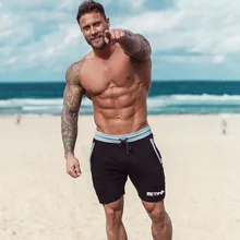 Мужские спортивные тренажеры фитнес бодибилдинг хлопковые шорты летний Стиль повседневные модные пляжные шорты мужские штаны для бега и тренировок брендовые штаны