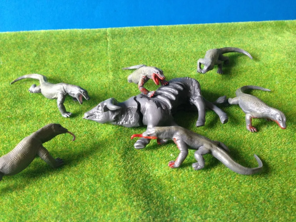 pvc figure Komodo dragon lizard eat water buffalo scene