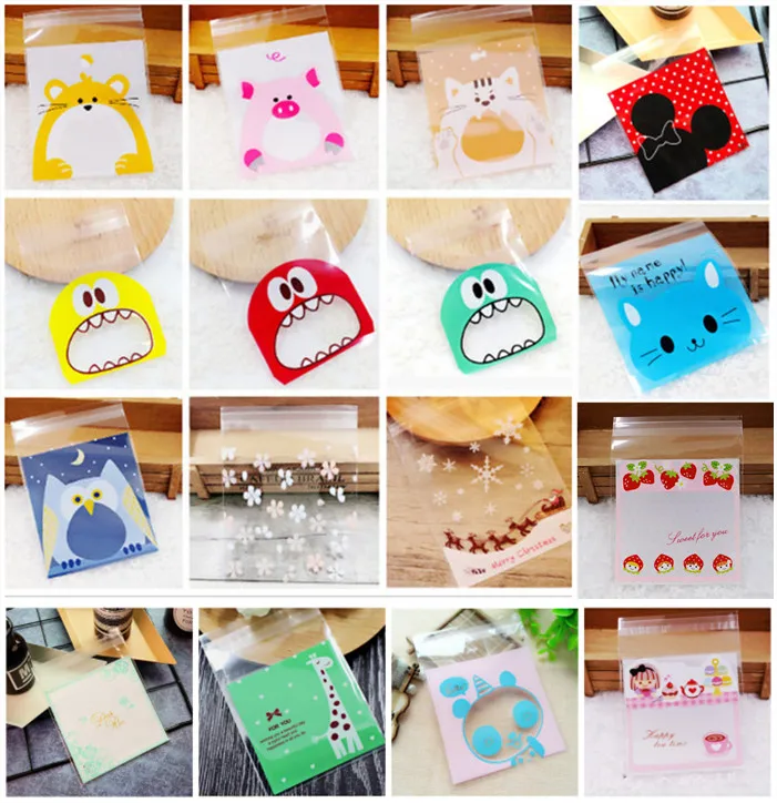 

100Pcs Cute cartoon clear Plastic Bag Wedding Birthday Halloween Cookie Candy Gift Packaging Bags OPP Self Adhesive Party Favors