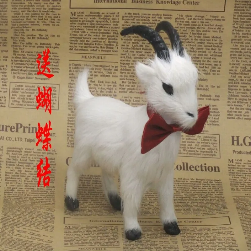 

Simulation model of animal goat furnishing articles wedding decoration fur animals goats to bow