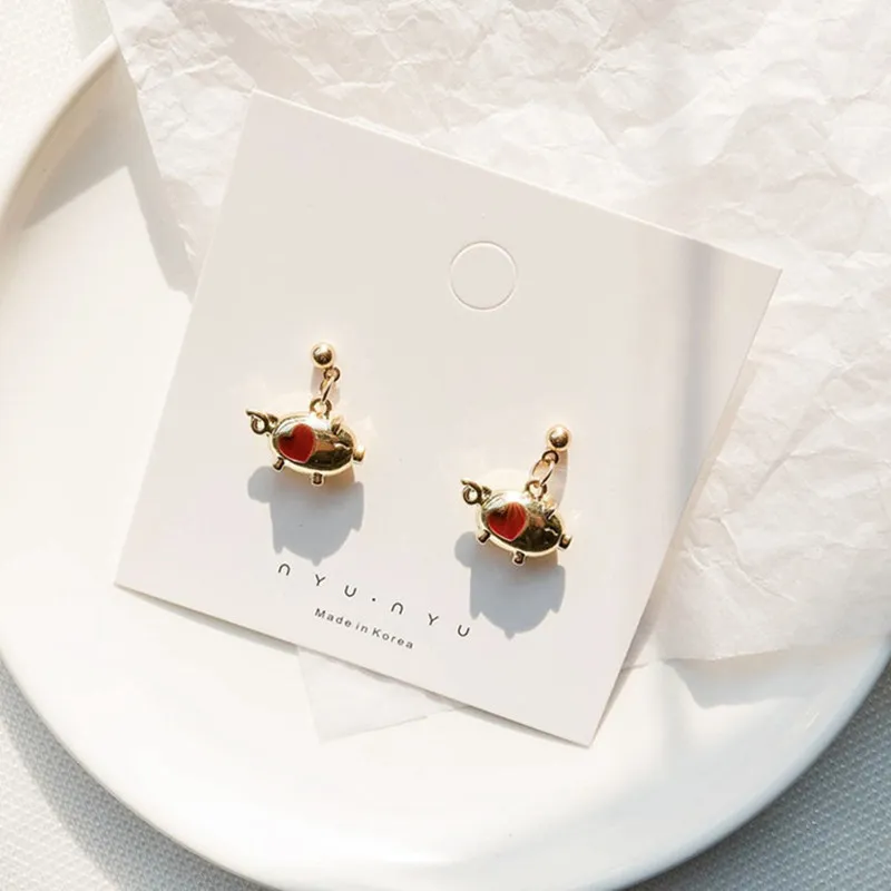

2 pcs The birth year golden pig earrings female autumn and winter models golden pigs new tide earrings Stud earring
