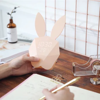 

Cute Rabbit LED Electronic Alarm Clock Sound Sensitive desktop clock Snooze Function Display Temperature and Calendar wall clock