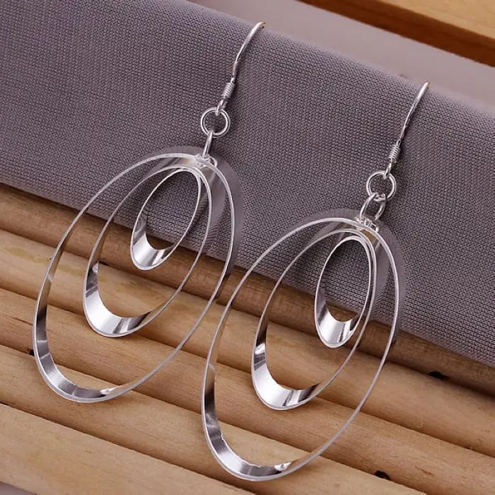 

Silver color fashion Charm creative female models Three discs Earrings Ornate oval earrings E180
