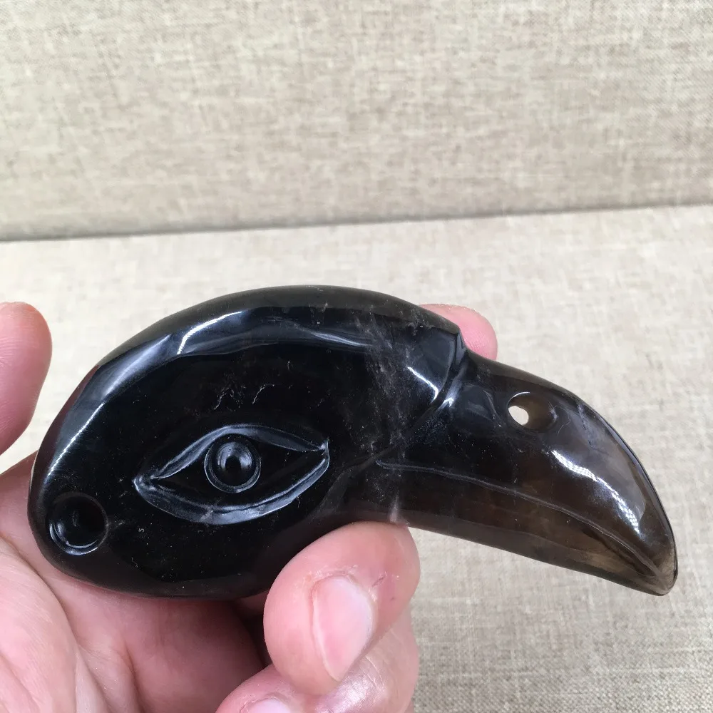 

NATURAL QUARTZ CRYSTAL carved bird skull T1332