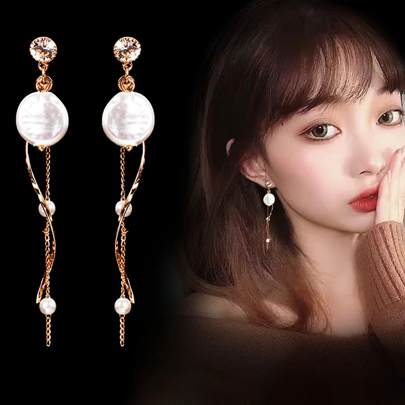 

Japanese and Korean version of temperament personality spiral pearl long tassel earrings ladies fashion earrings