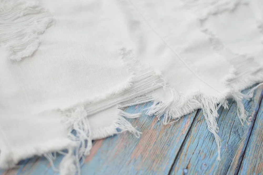 Women's high waist hip half skirt in pure white irregular worn foot tassel spring summer popular wild (19)