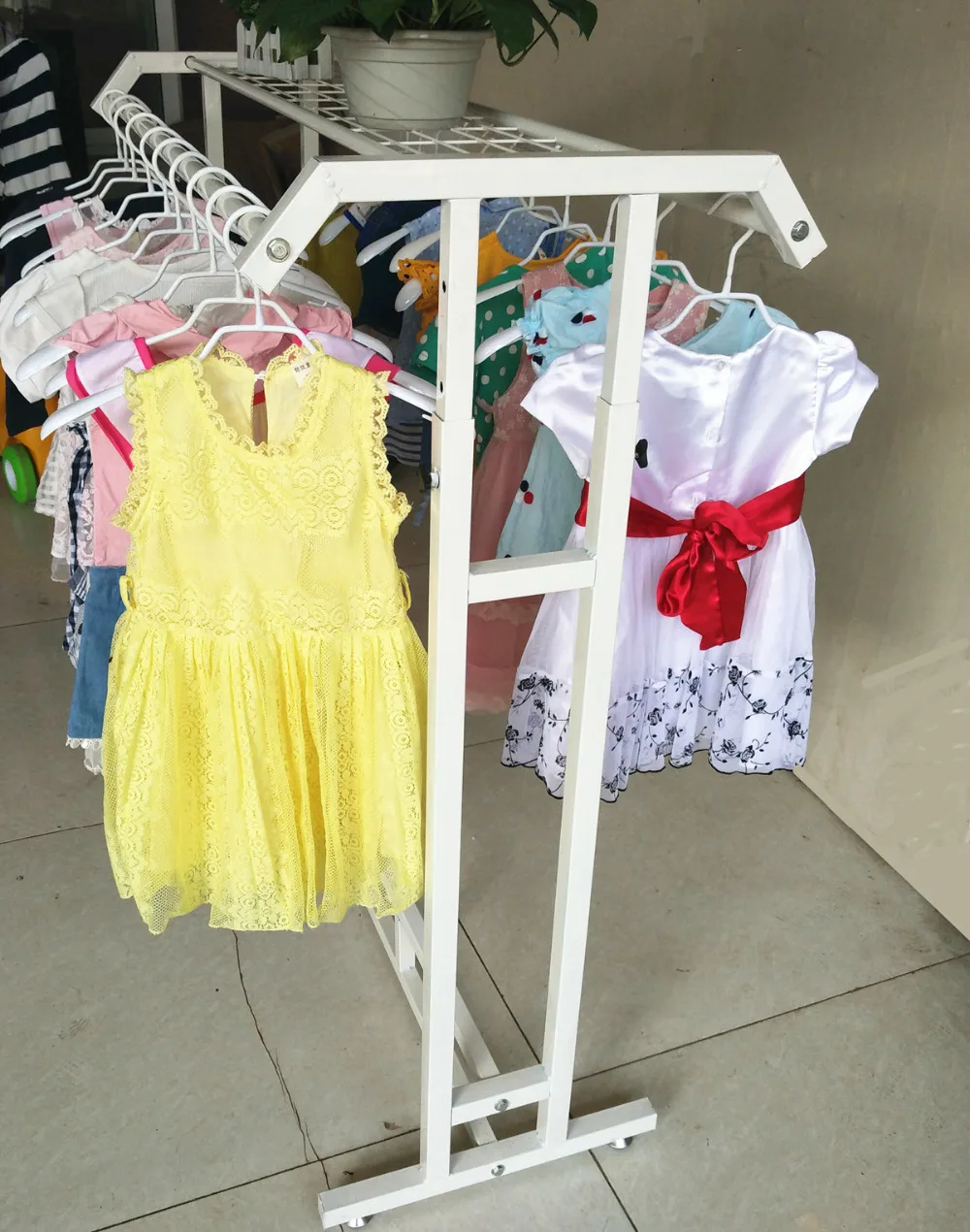 Clothing hangers. Show. Bedroom floor type hanger.