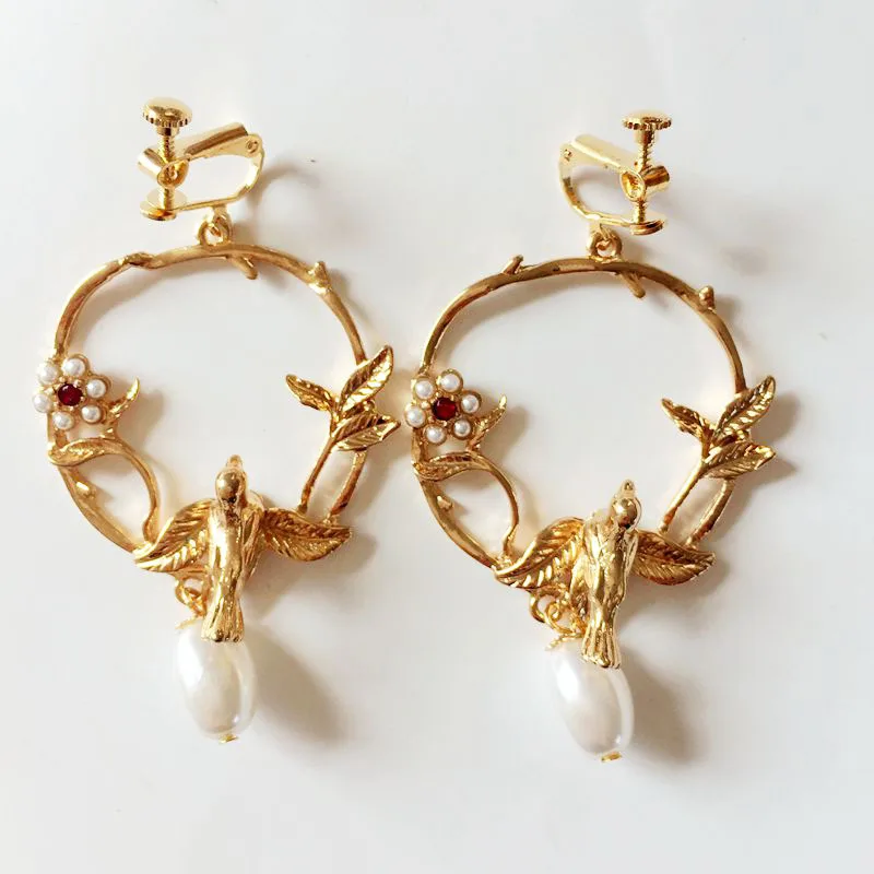 

Free Shipping New Elegant Pearl Bird Clip Earring