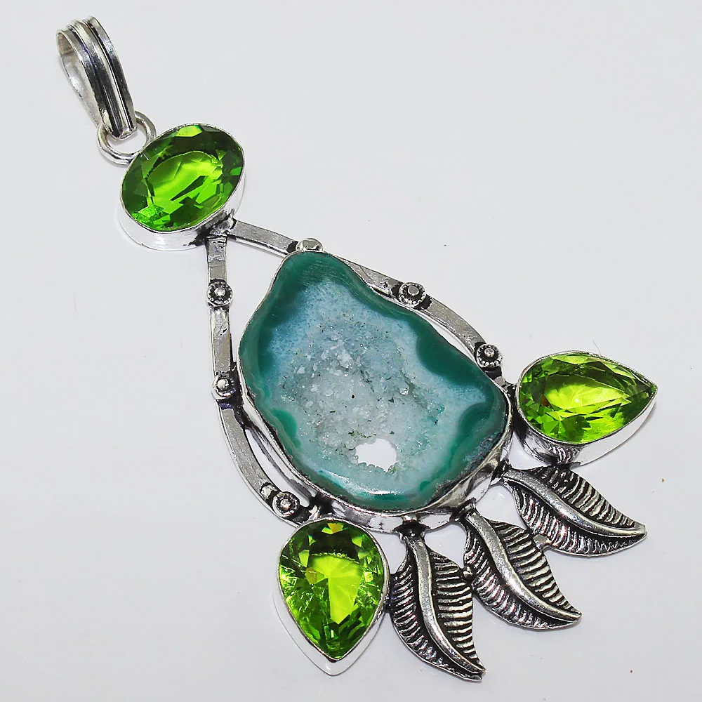 

Solar Quartz & Peridot Pendant Silver Overlay over Copper , 85 mm, P1077