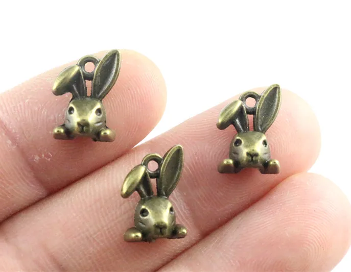 

14x10mm 30 Uds. Cabeza de conejo chapada en bronce antiguo abalorios hechos a mano colgante: DIY para necklace-Q3-20 de pulsera