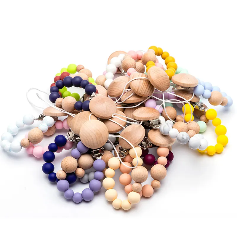 

Baby Pacifier Clip Chain Teething Wooden Beads Dummy Clip Chew Pacifier Clips Leash Nipple Holder Teether Baby Nipple Clips