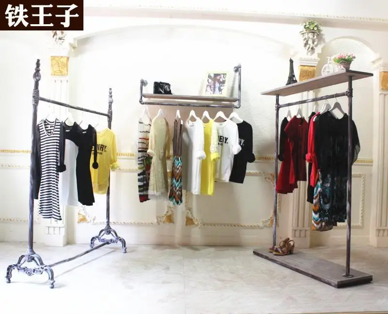 Iron vintage clothing rack on the wall to do the old wood frame Unisex