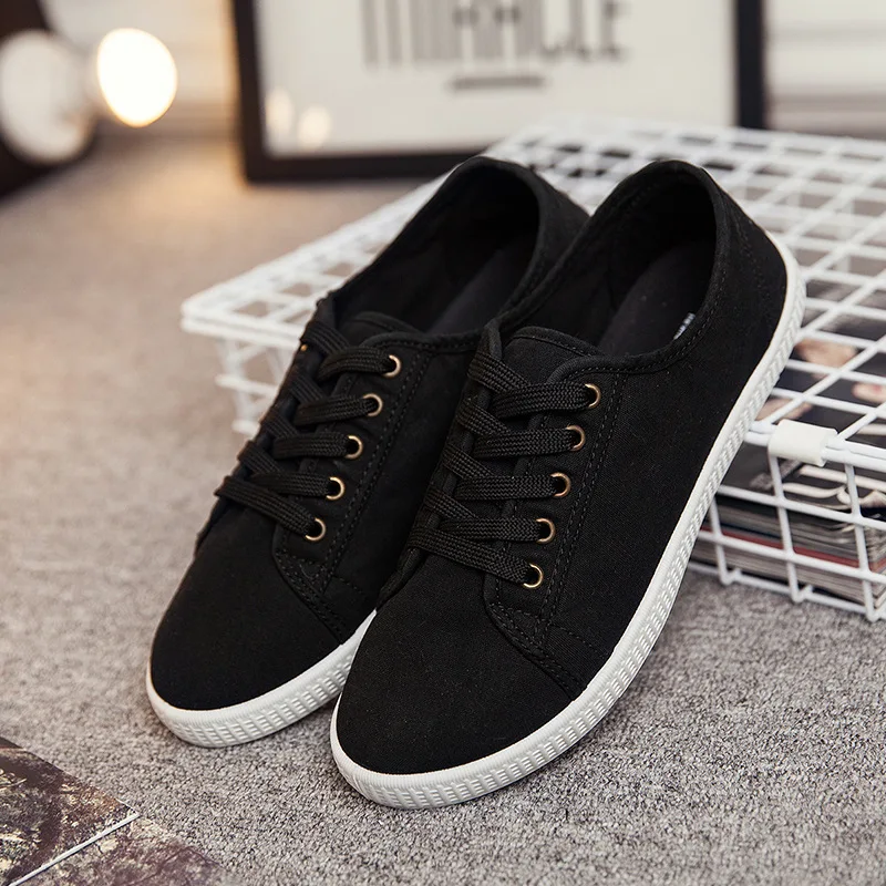 all white canvas shoes