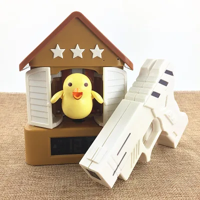 

alarm clock For a lazy person The lazy bane Creative new strange new cuckoo clock The shooting gun
