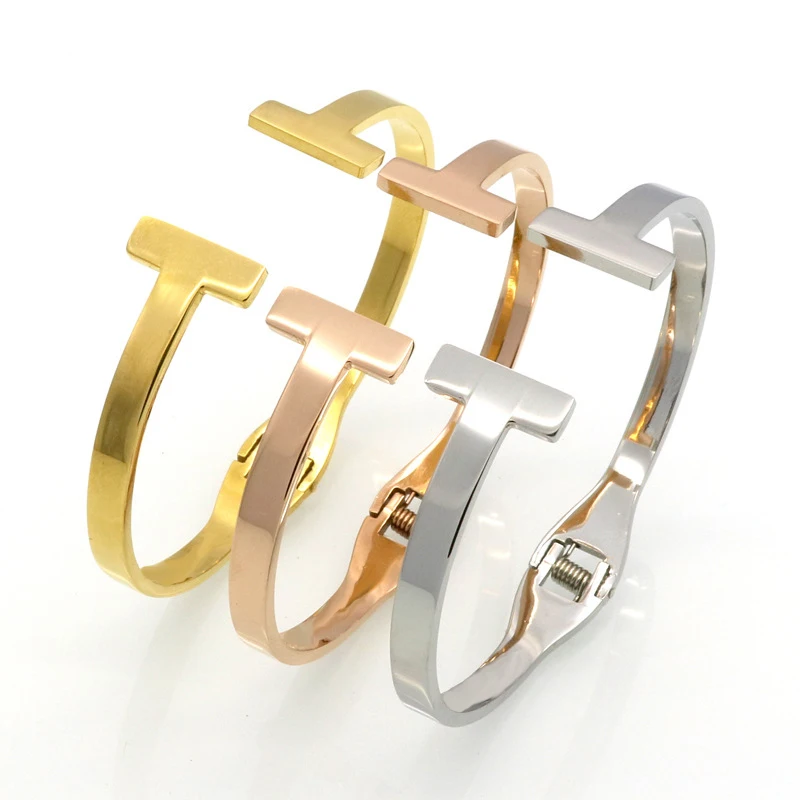

Fashion Jewelry Top Quality Stainless Steel Gold Colour Spring Snap Bracelet Double T Bangle For Women Jewelry Bangles Wholesale