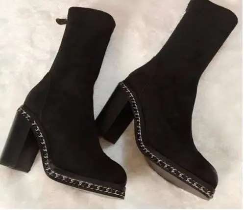 black heeled boots round toe