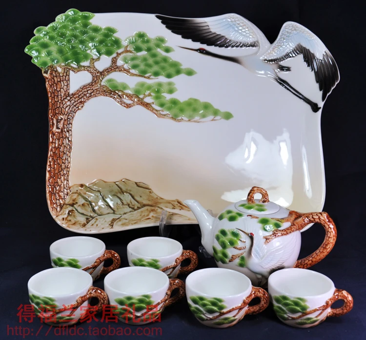 

Colored enamel porcelain kung fu tea set High-end gift include(1 teapot+6teacup+1tea tray) pine crane carved by hand
