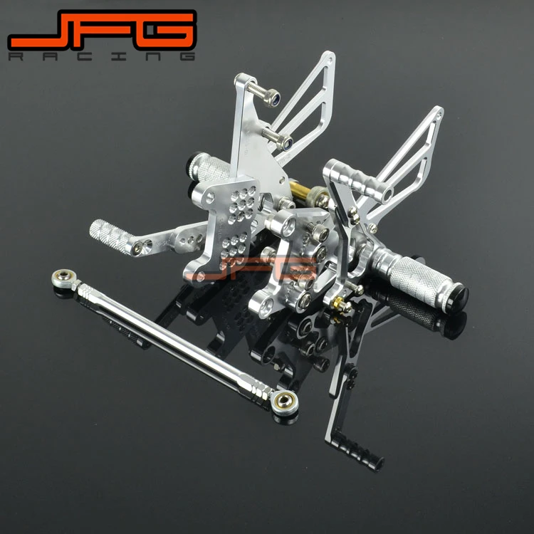 

Motorcycle CNC Adjustable Foot Pegs Pedals Rest Rearset Footpegs For TRIUMPH T595