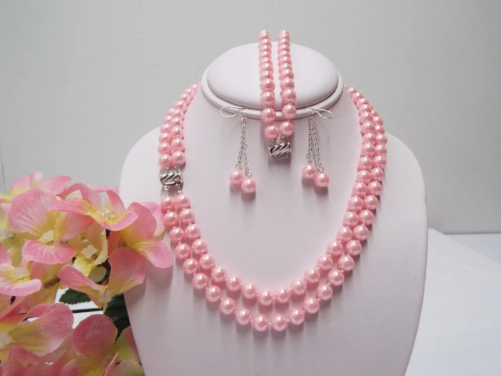 

Hot selling free shipping*****SPRING SALE South Sea Shell Pink Pearl Necklace & Bracelet Earrings Silk Bag