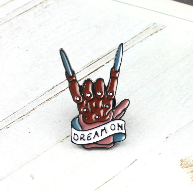 

Gothic Skeleton Hand Brooch DREAM ON Rock Band Cool Gesture Enamel Pins Rockin'Rock Denim Jackets Custom Badge Fans Punk Gifs