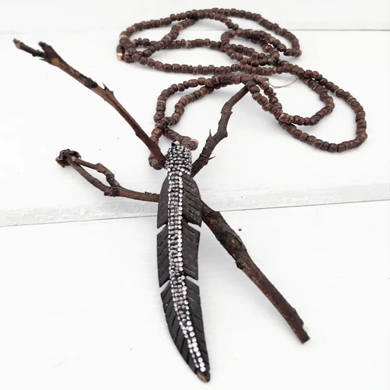 

Dongmu jewellery new 2018 bohemian fashion handmade natural wood making feather lady necklace boutique jewelry new year gift