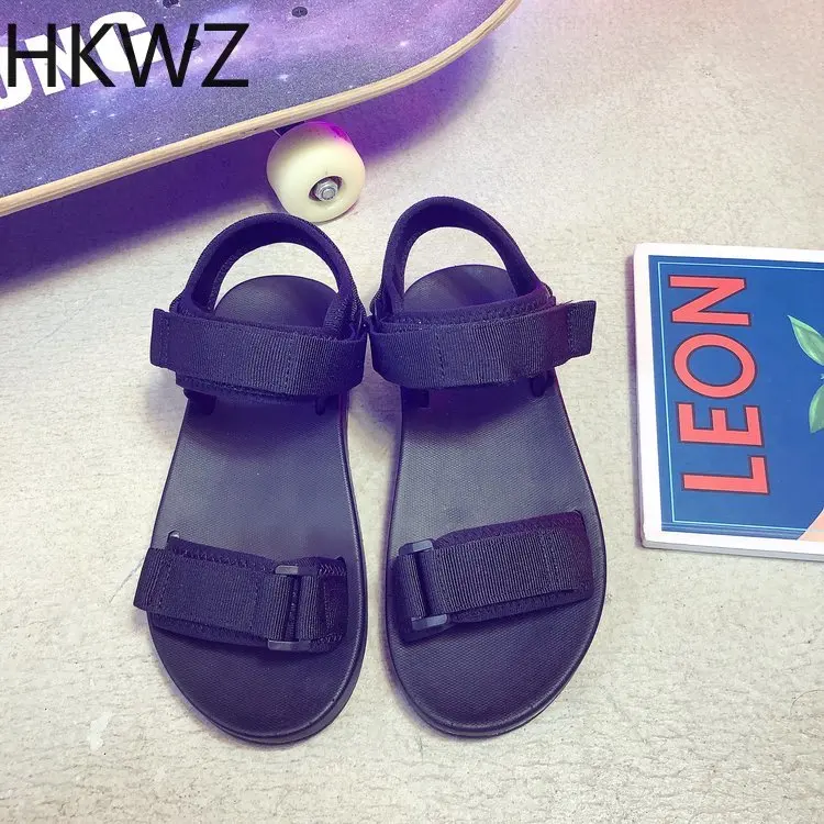 

Korean version of the 2019 summer new net red toe beach shoes comfortable simple black flat sandals women shoes sandals