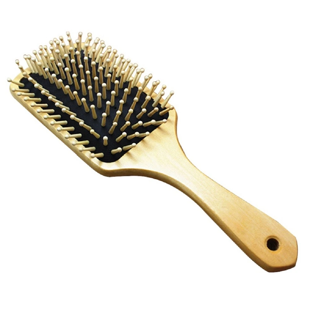 brosse en bois cheveux bouclés