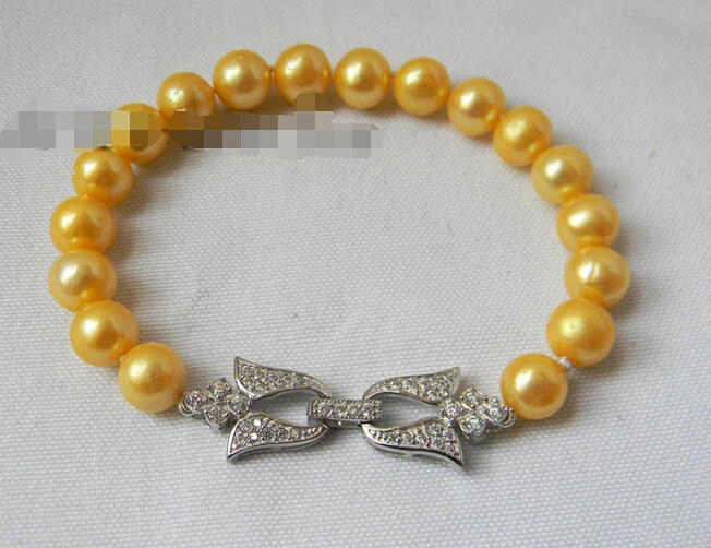

Free shipping >>>>>>8'' 9mm Golden Round Freshwater Pearl Bracelet