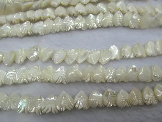 

wholesale 2strands 12mm Genuine MOP Shell ,Pearl Shell beads ,heart,fish carved white spacer bead