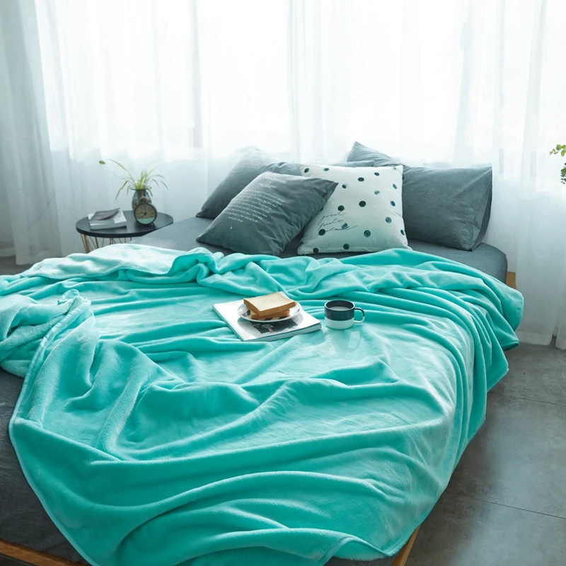 Is Light Blue Thicken Flannel Quilt Blanket On The Bed Very Smooth