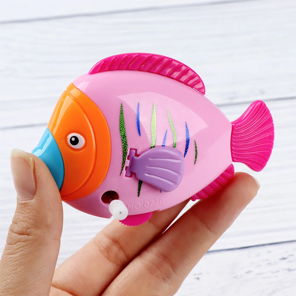 1pc Colorful Fish Shape Clockwork Toy Move The Tail Classic Toy Hobbies Cartoon Fish Wind Up Toy for Children Color Random 1pc Colorful Fish Shape Clockwork Toy Move The Tail Classic Toy Hobbies Cartoon Fish Wind Up Toy for Children Color Random