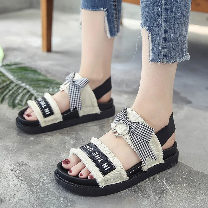 

Summer new Korean version cloth fashion letters sweet bows thick bottom low-heeled students sandals Casual Slip-On