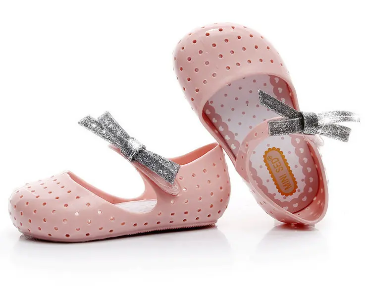 

2017 summer new MINI SED flashing powder bowknot magic patch Baotou hole hole shoes boys and girls jelly shoes sandals