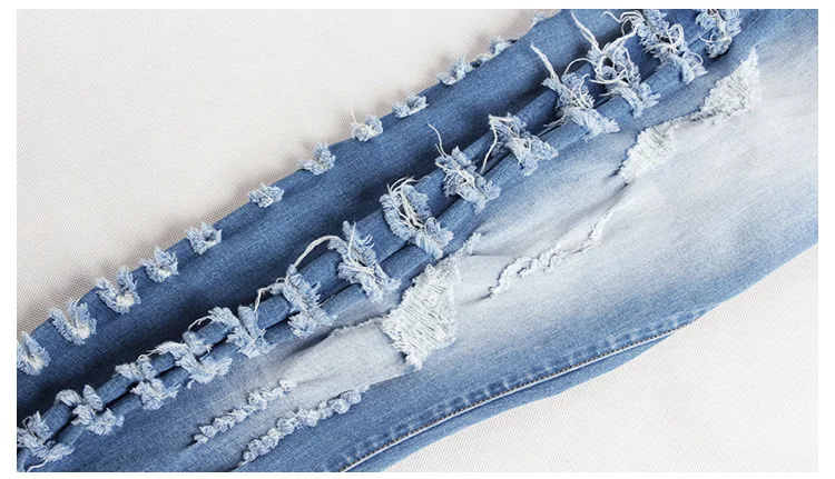 2017 autumn and winter fashion Europe and the United States foreign trade women's holes Slim stretch jeans feet pencil jeans (12)